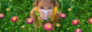The child is seasonal allergy to flowers. Learn how to effectively manage your child's asthma and allergies with Children's Medical Group's guide.
